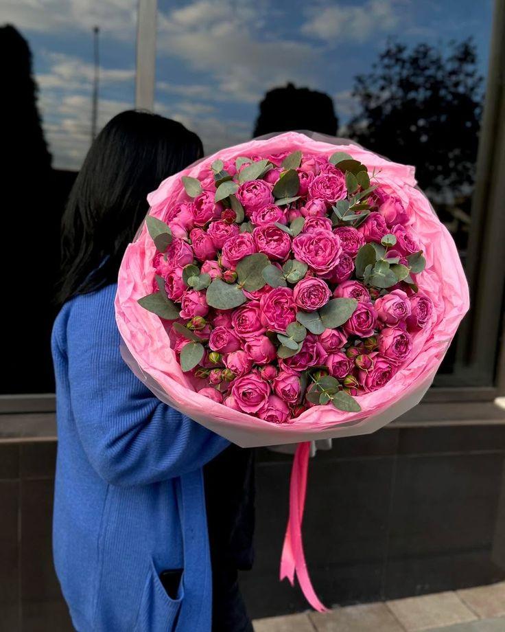 Professional floral arrangement in modern corporate setting